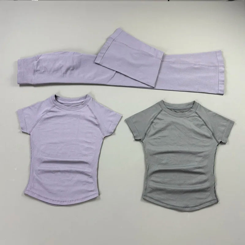Conjunto deportivo de 2 piezas: leggings acampanados y top de manga corta